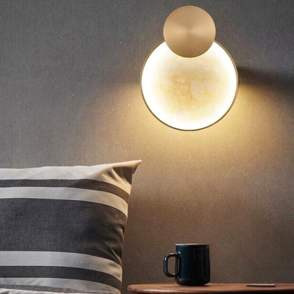 applique murale ronde dorée